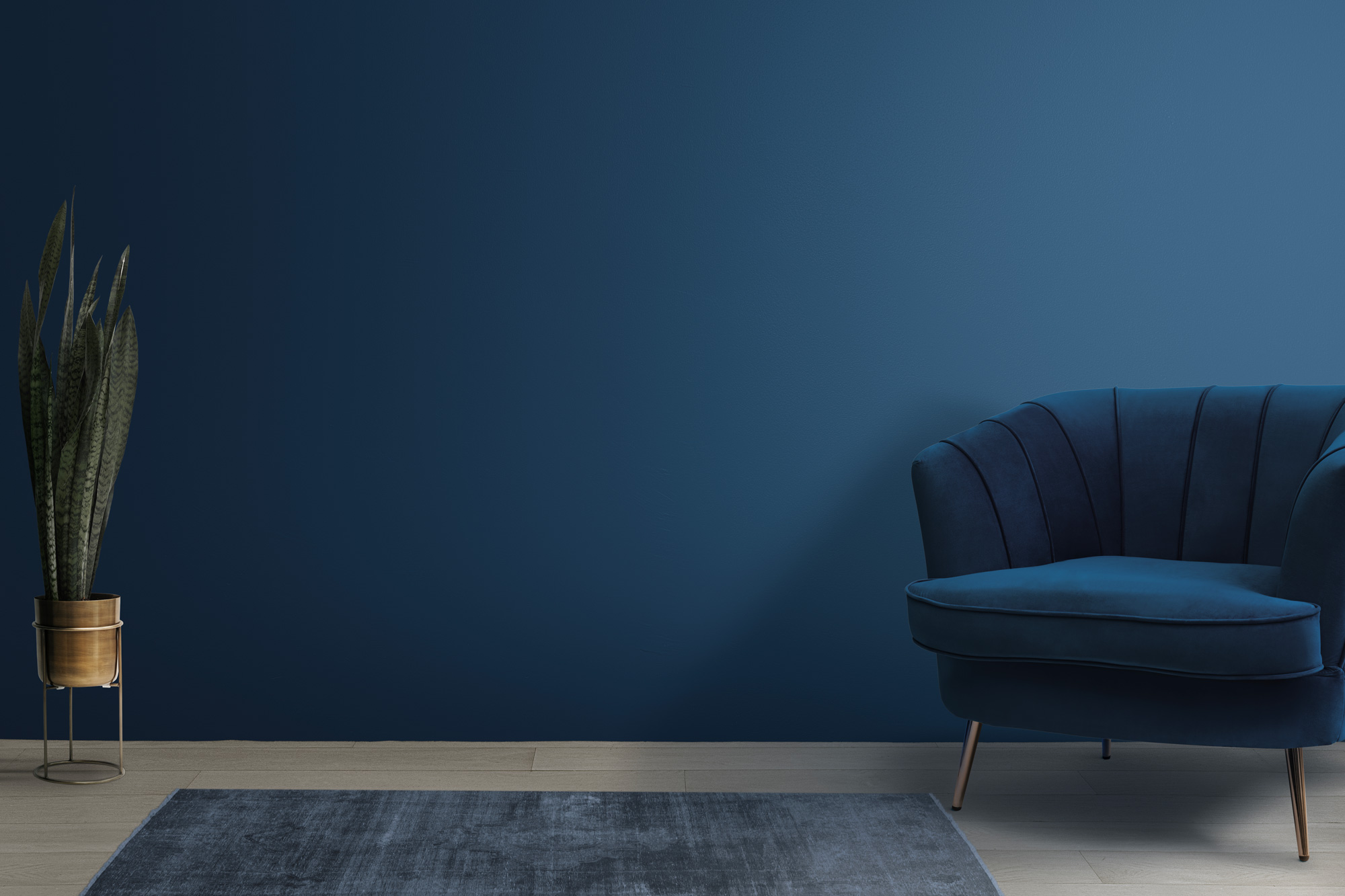 Salon bleu épuré avec fauteuil mur plante